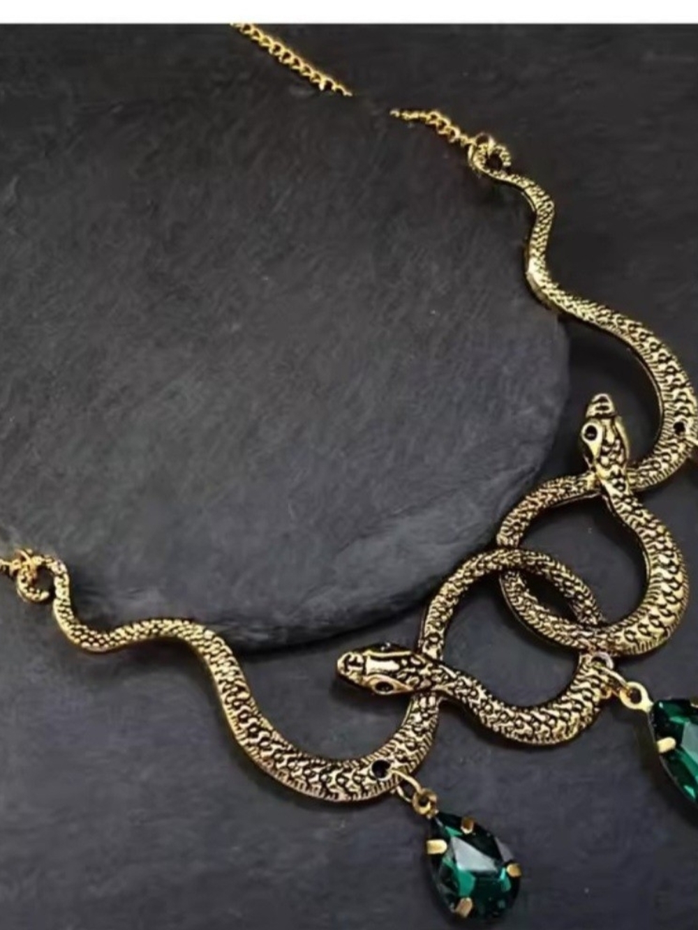 Gothic Entwined Snakes Necklace with Emerald Crystal Pendants.